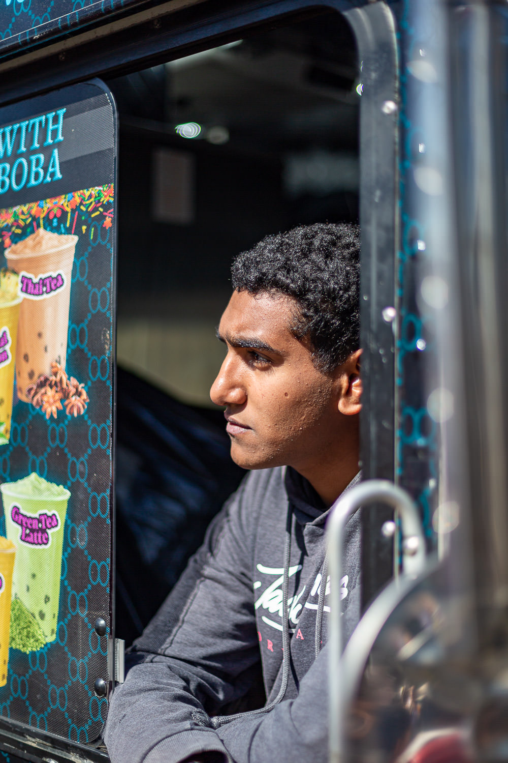 Food truck worker serving customers
