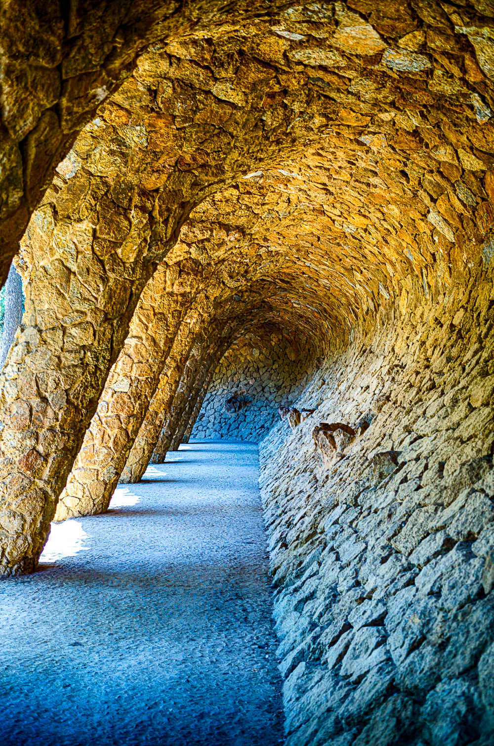Natural rock tunnel in Spain framing the coastline