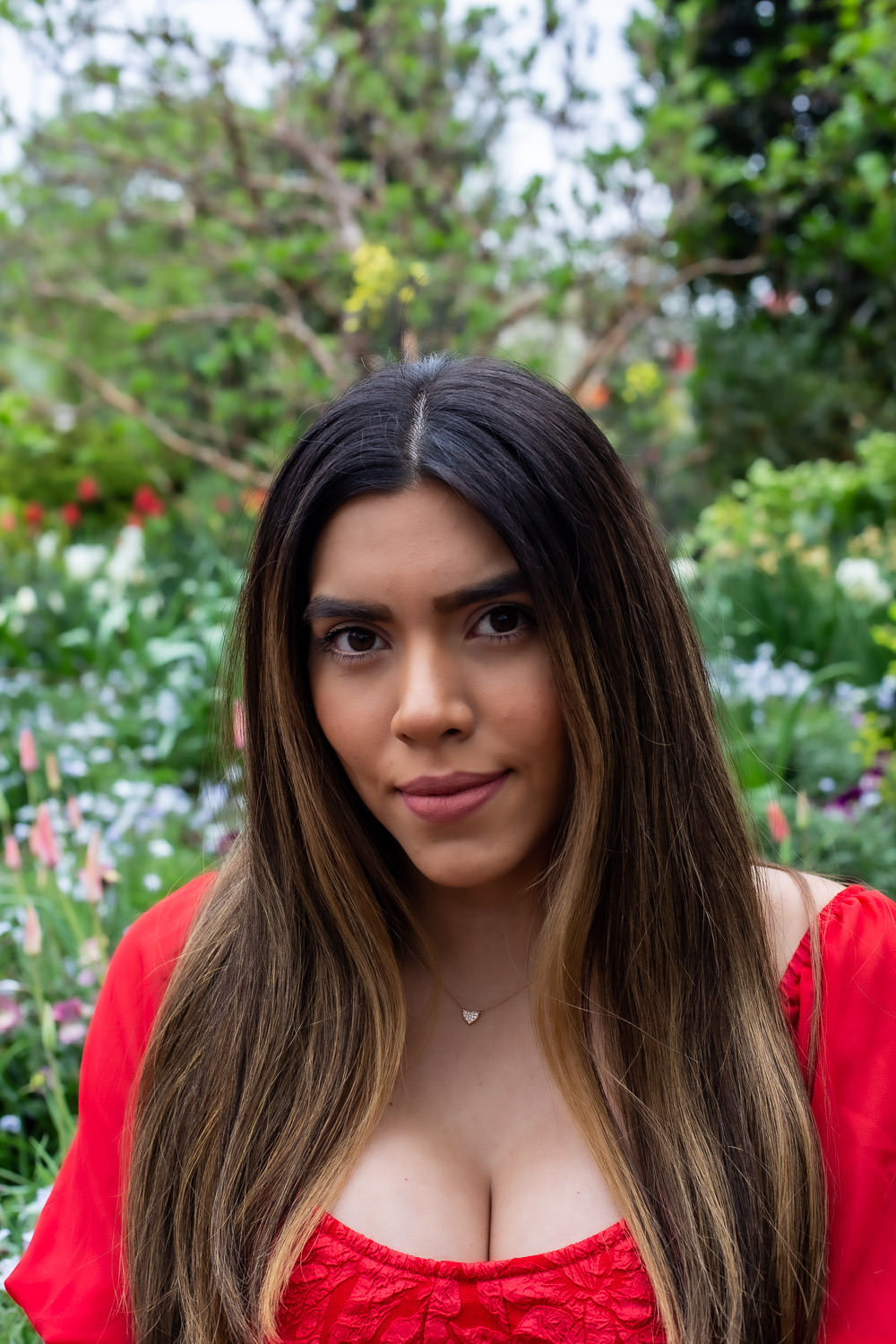 Ethvelyn Lovera surrounded by blooms