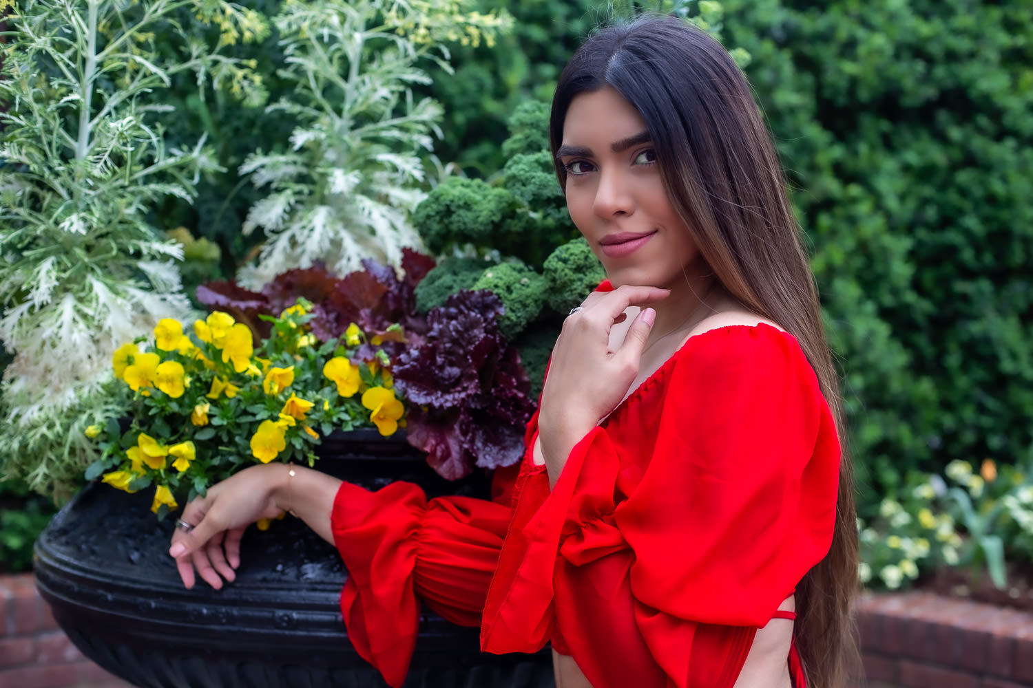 Ethvelyn Lovera by a planter