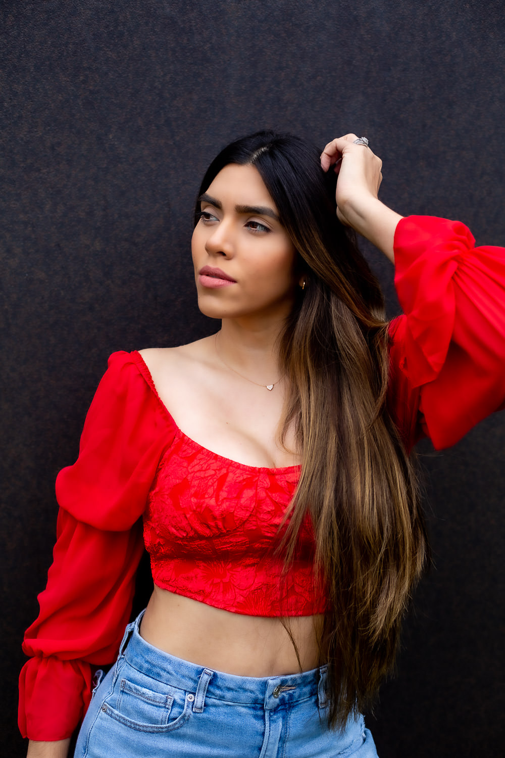 Ethvelyn Lovera stone backdrop portrait