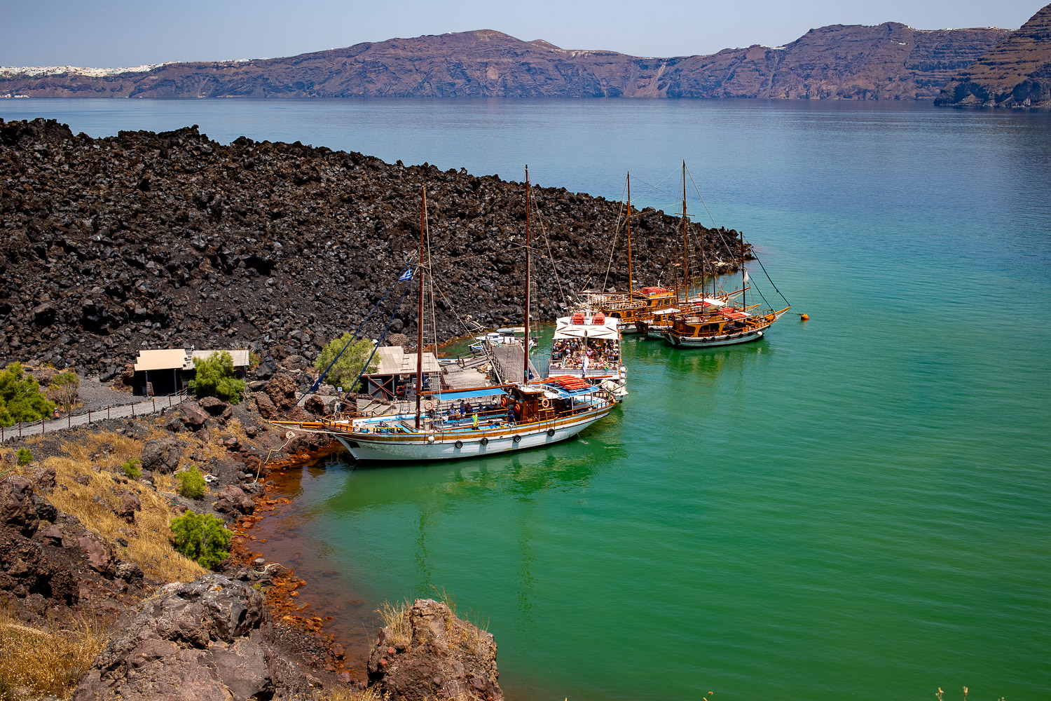 Boats anchored in a calm bay
