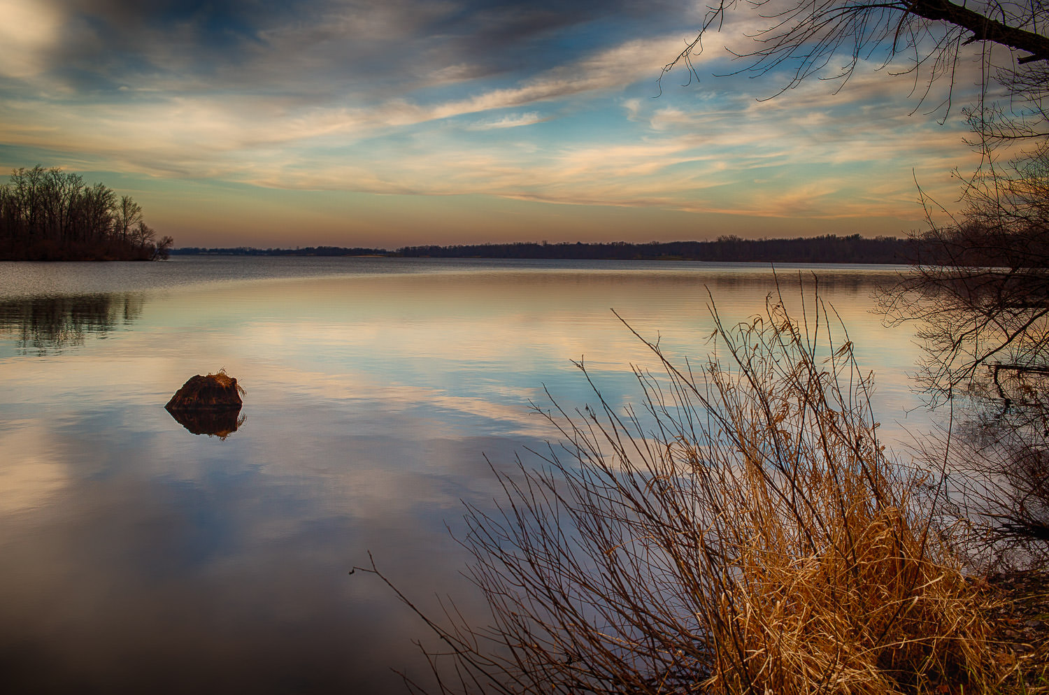 Calm lake with mountain backdrop