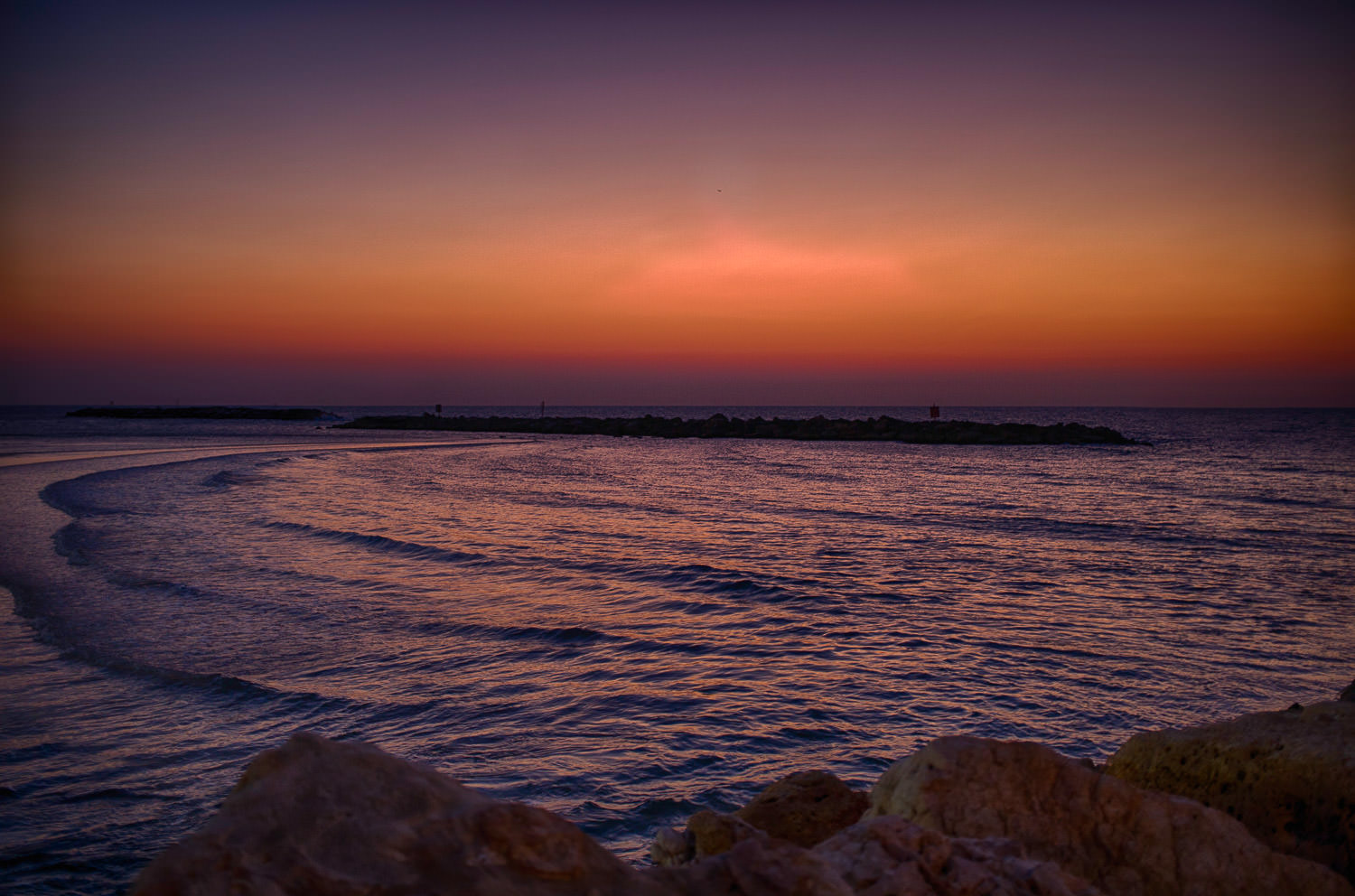 Sunset over a tranquil horizon