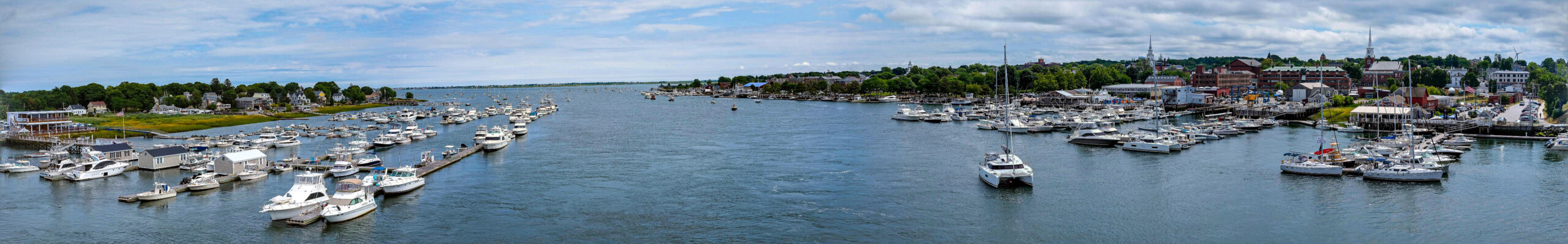 Harbor with boats on New England coast